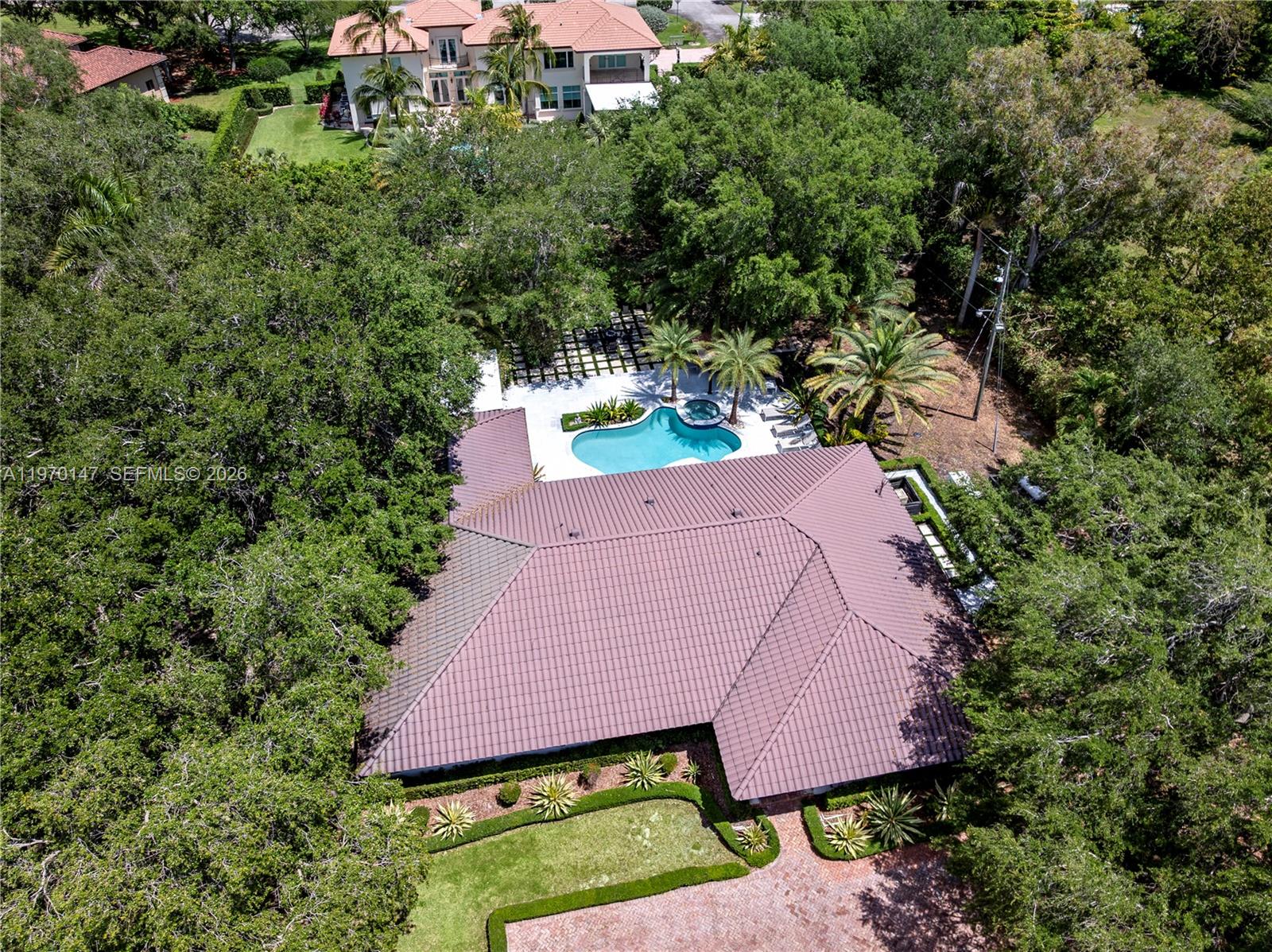 8801 Southwest 124th Street Miami, FL 33176 - Photo 44 of 48 an aerial view of a house with yard and outdoor seating