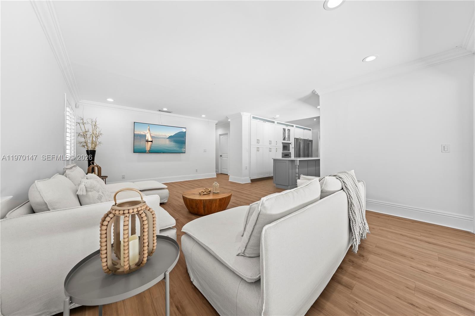 8801 Southwest 124th Street Miami, FL 33176 - Photo 7 of 48 a living room with furniture and a wooden floor