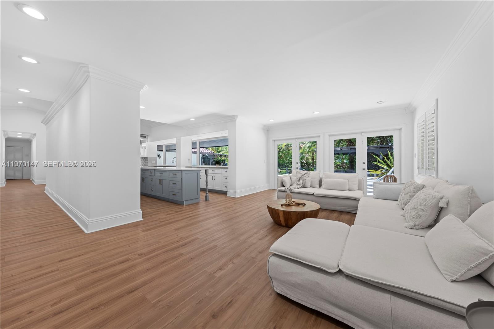 8801 Southwest 124th Street Miami, FL 33176 - Photo 9 of 48 a living room with furniture and a wooden floor
