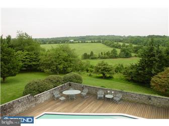 80 Province Line Road Skillman, NJ 08558 - Photo 12 of 12 a view of a green field with wooden fence