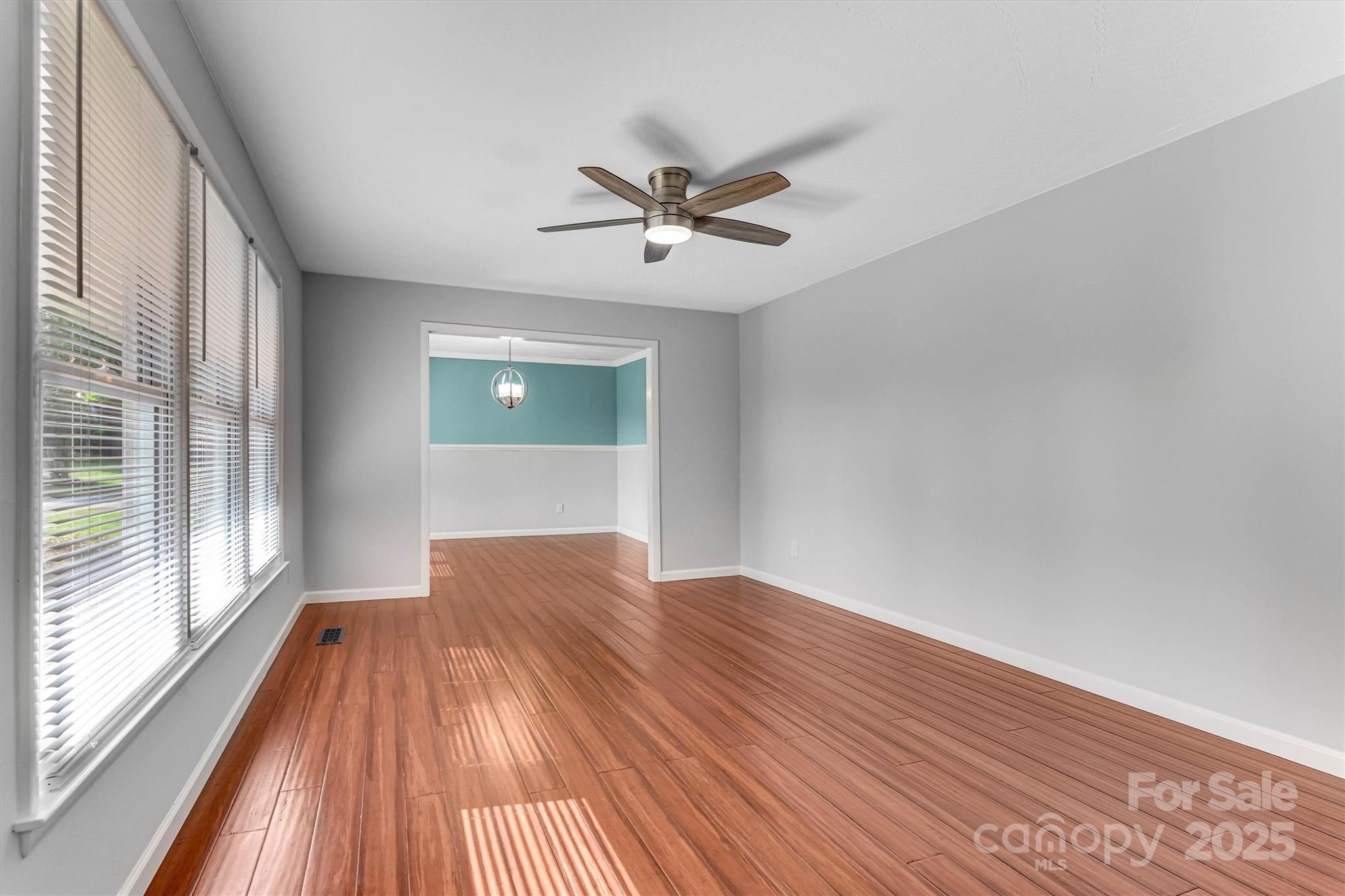 4015 Highway 18 Vale, NC 28168 - Photo 17 of 45 a view of a big room with wooden floor and windows