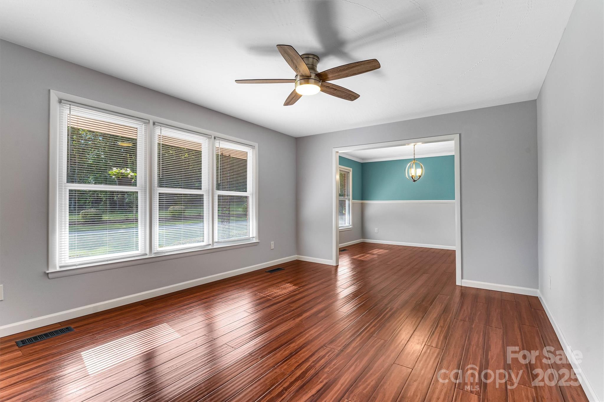 4015 Highway 18 Vale, NC 28168 - Photo 18 of 45 a view of empty room with wooden floor and fan
