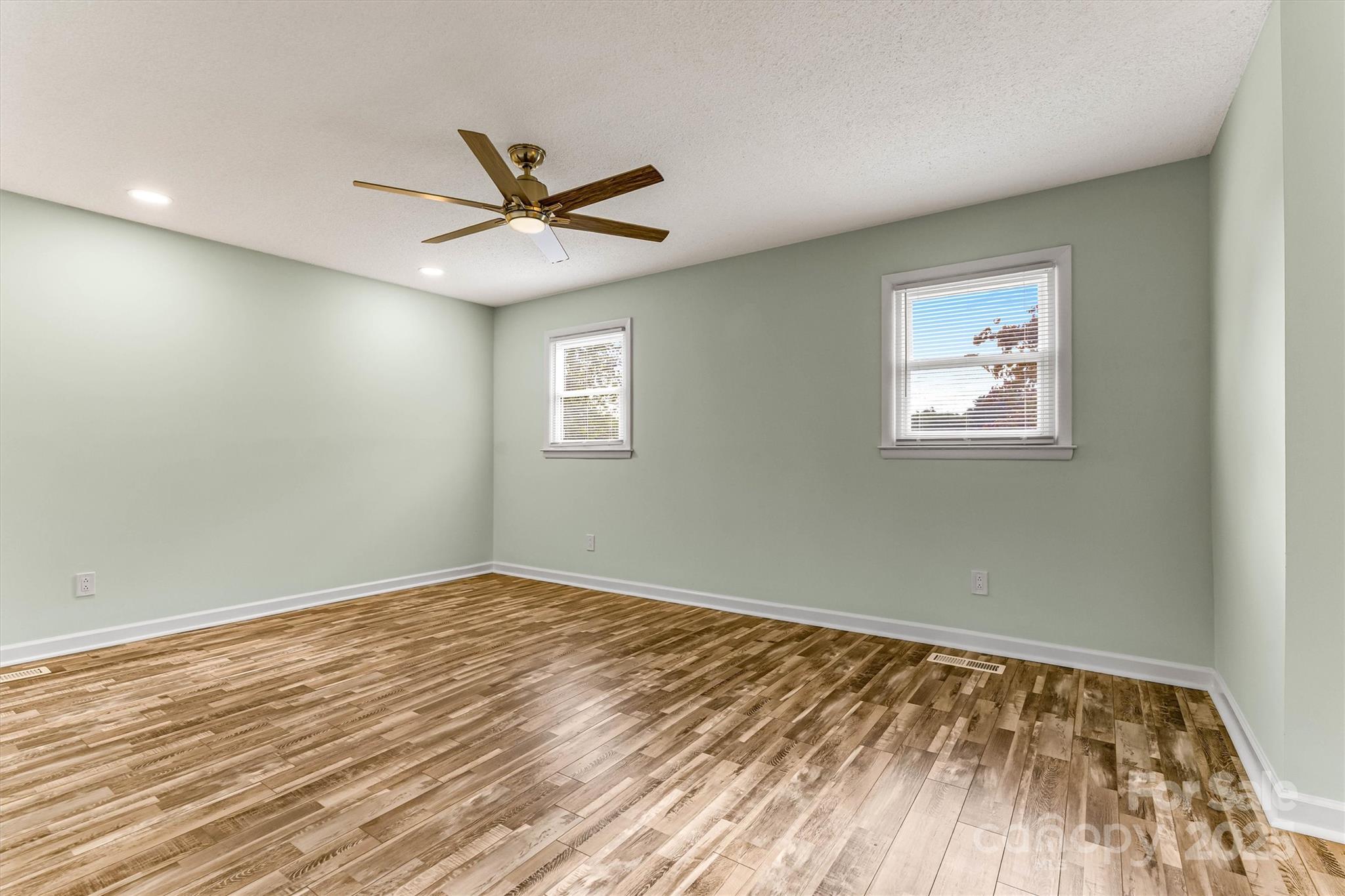 4015 Highway 18 Vale, NC 28168 - Photo 21 of 45 a view of an empty room with wooden floor and a window