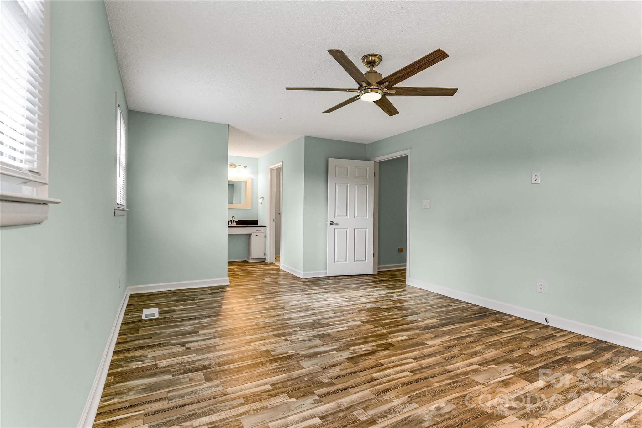 4015 Highway 18 Vale, NC 28168 - Photo 23 of 45 a view of empty room with wooden floor and window