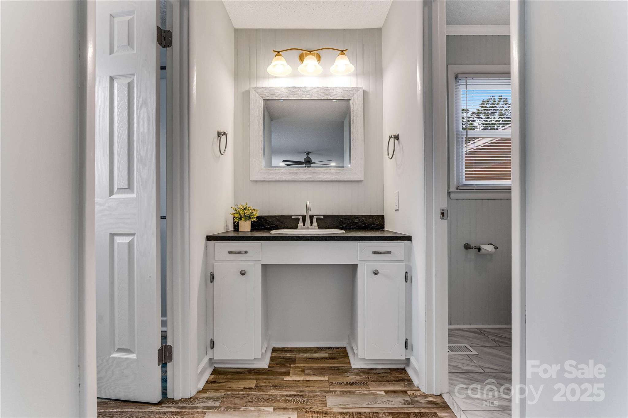4015 Highway 18 Vale, NC 28168 - Photo 25 of 45 a bathroom with a sink and a mirror