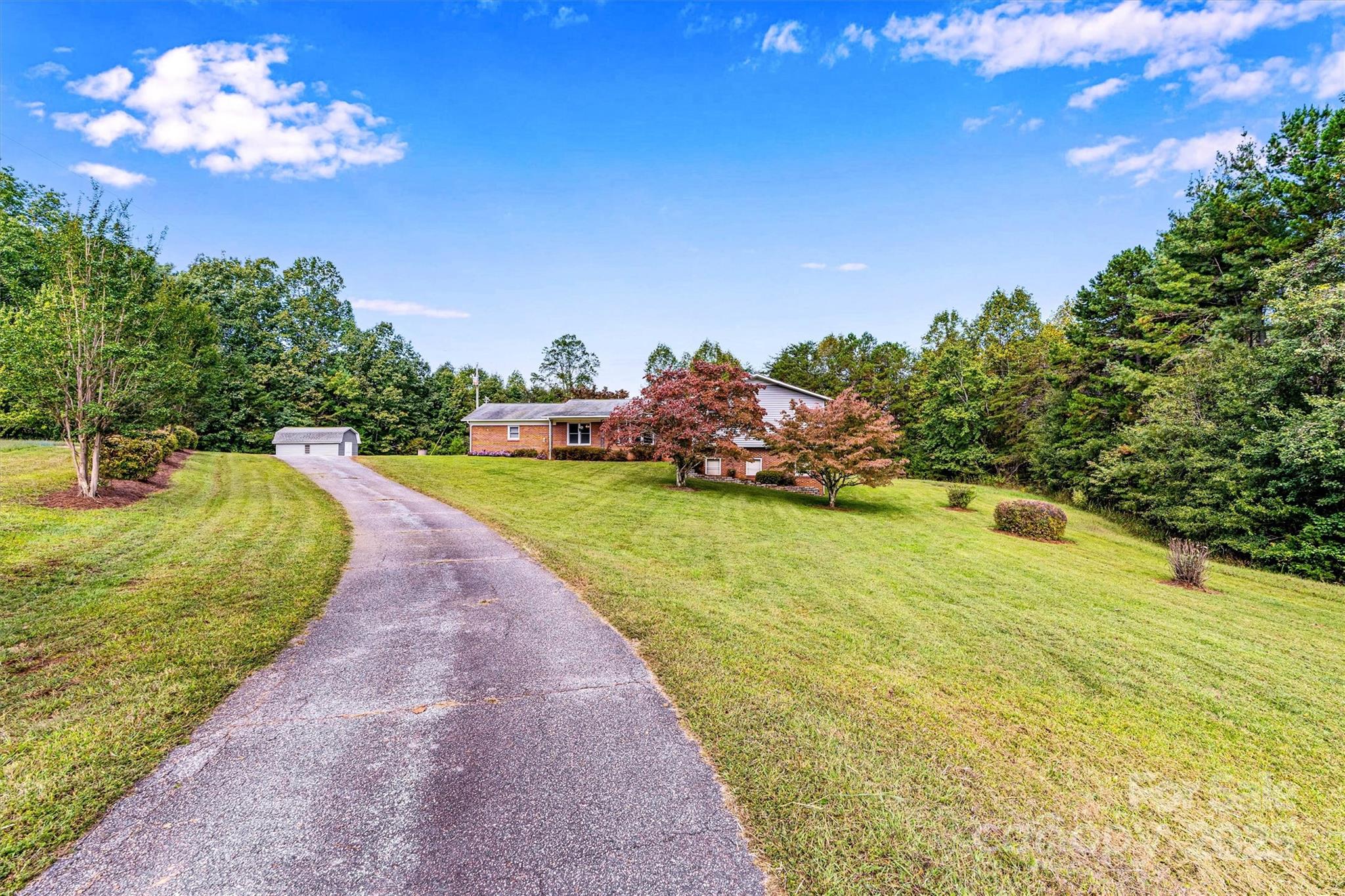 4015 Highway 18 Vale, NC 28168 - Photo 3 of 45 a view of a swimming pool with an outdoor space and seating area