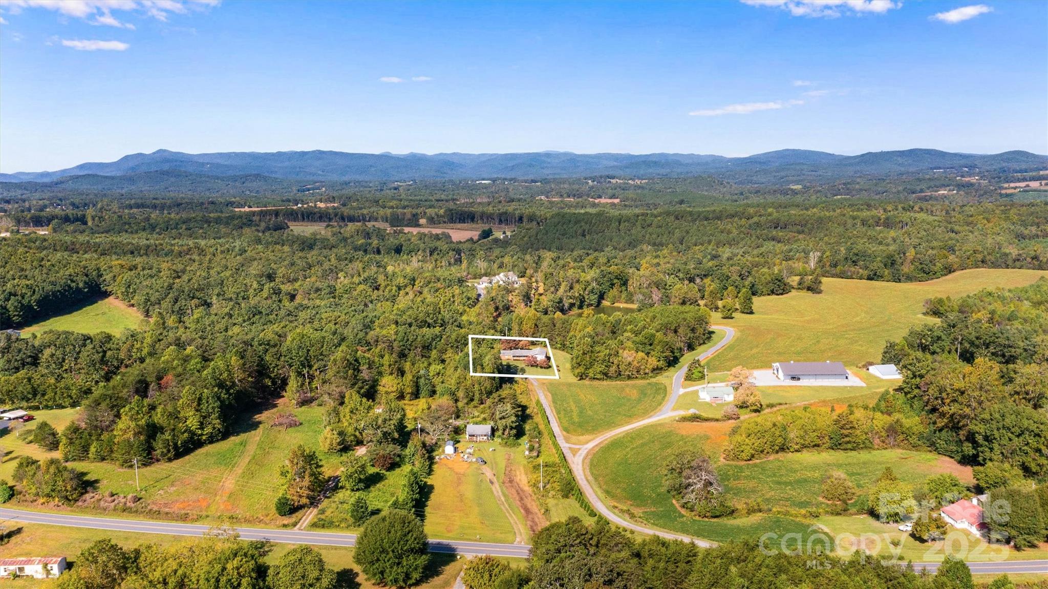 4015 Highway 18 Vale, NC 28168 - Photo 43 of 45 a view of a swimming pool with a table chairs