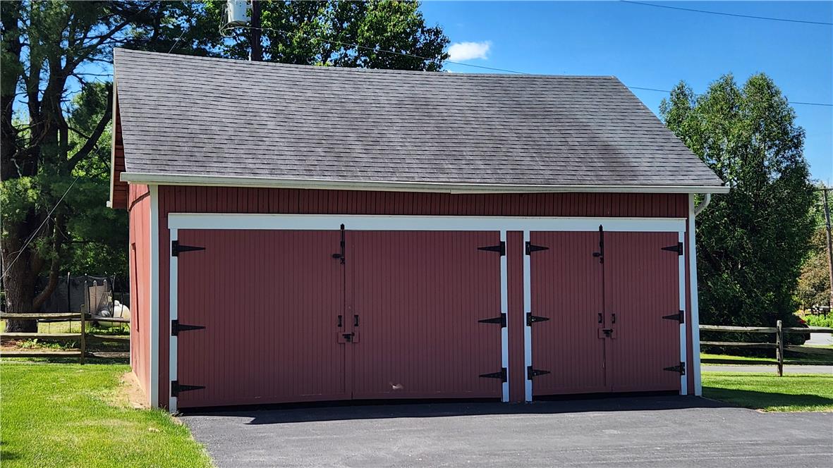 4912 Shankweiler Road Orefield, PA 18069 - Photo 61 of 74 A classic red barn-style garage offers generous storage and curb appeal.