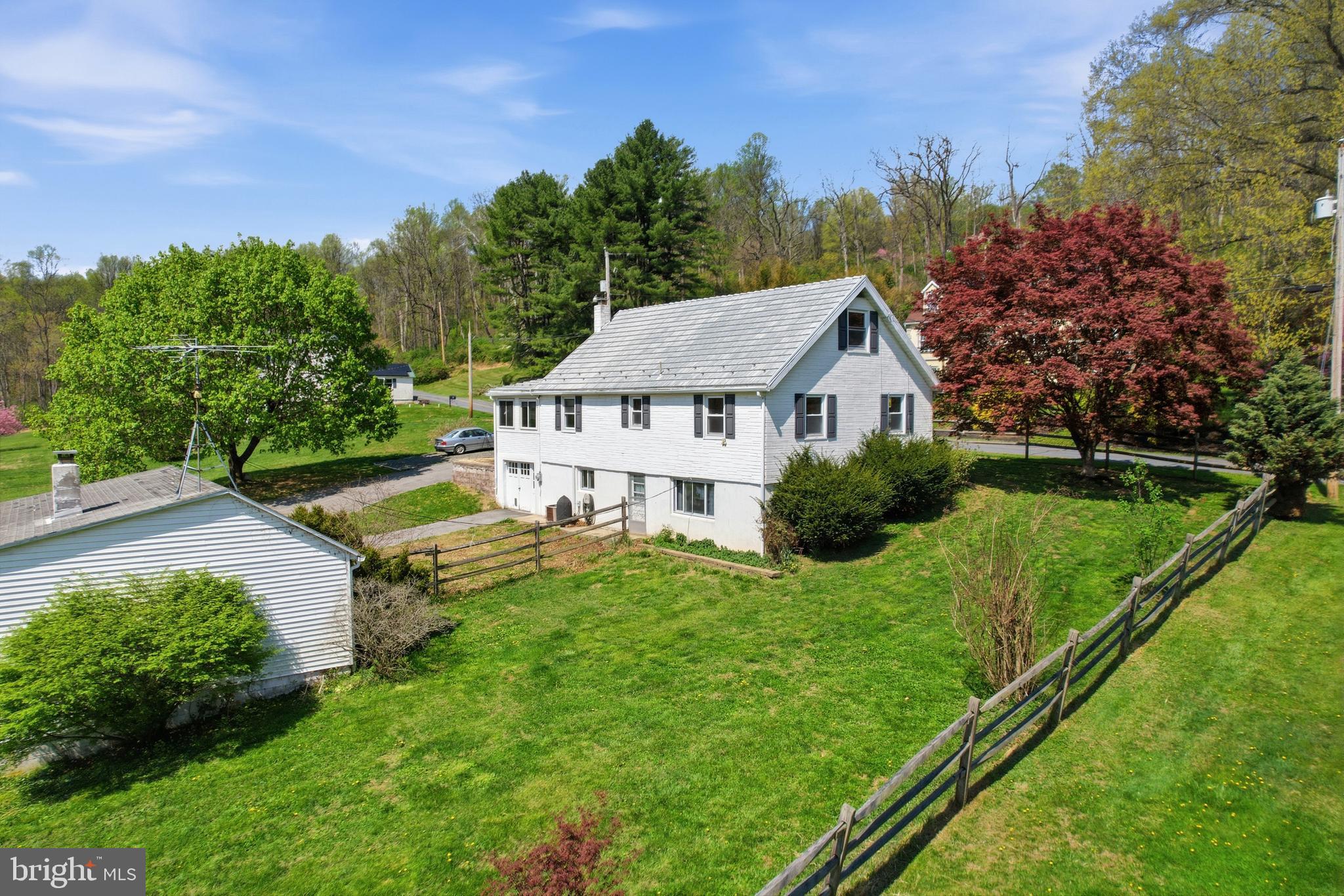 238 Kemp Road Barto, PA 19504 - Photo 49 of 68 Rear of home and detached garages Fenced yard