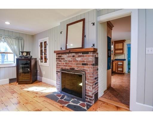 11 Parmenter Road Wayland, MA 01778 - Photo 7 of 29 a living room with furniture and a fireplace