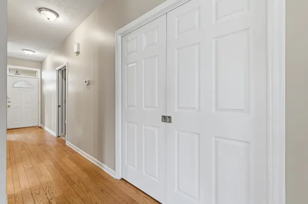 a view of a door and a window