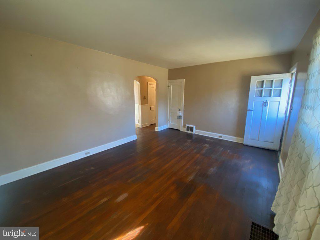 3494 Allen Road Eden, MD 21822 - Photo 16 of 38 an empty room with wooden floor and windows