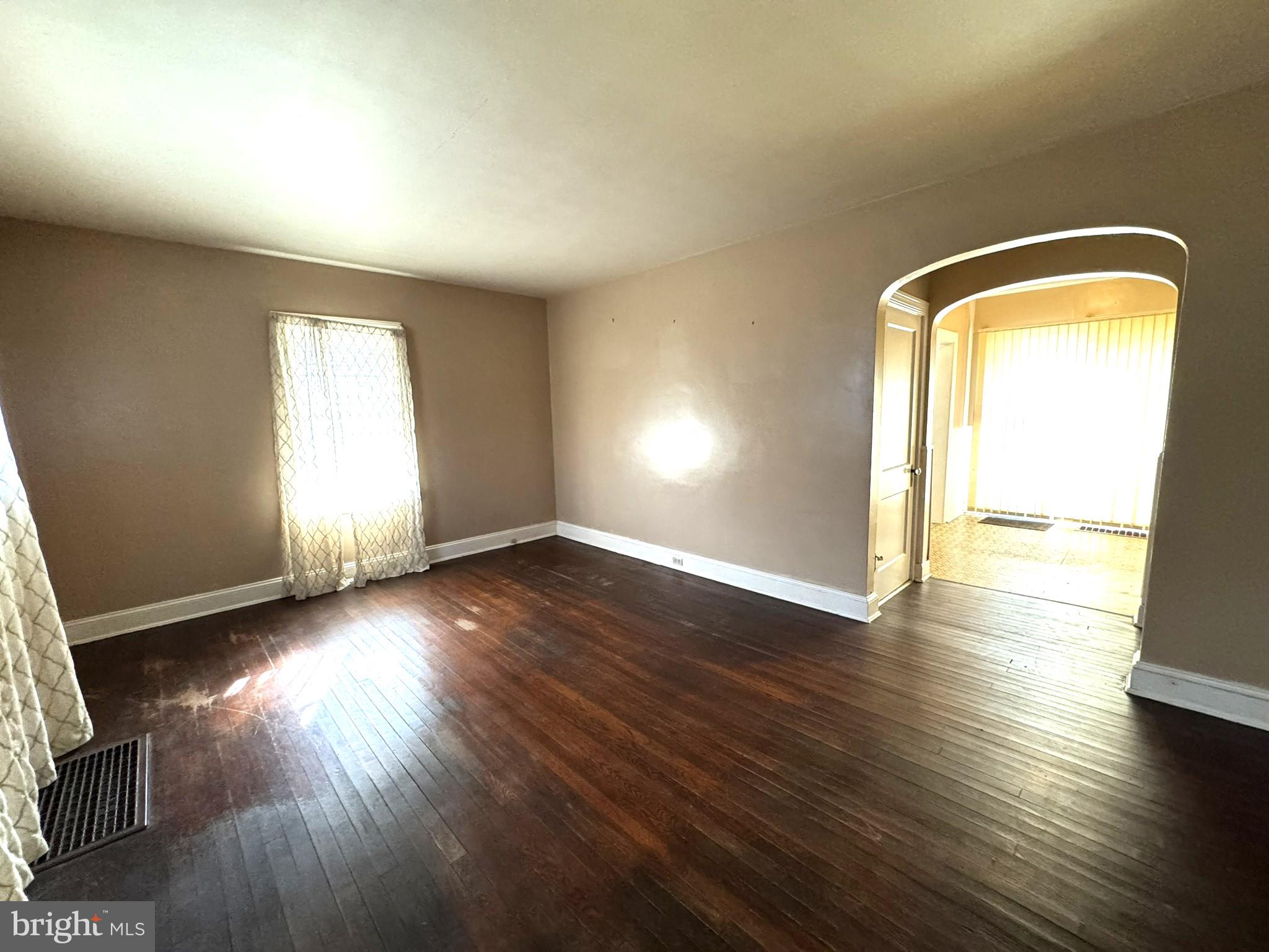 3494 Allen Road Eden, MD 21822 - Photo 18 of 38 an empty room with wooden floor and windows