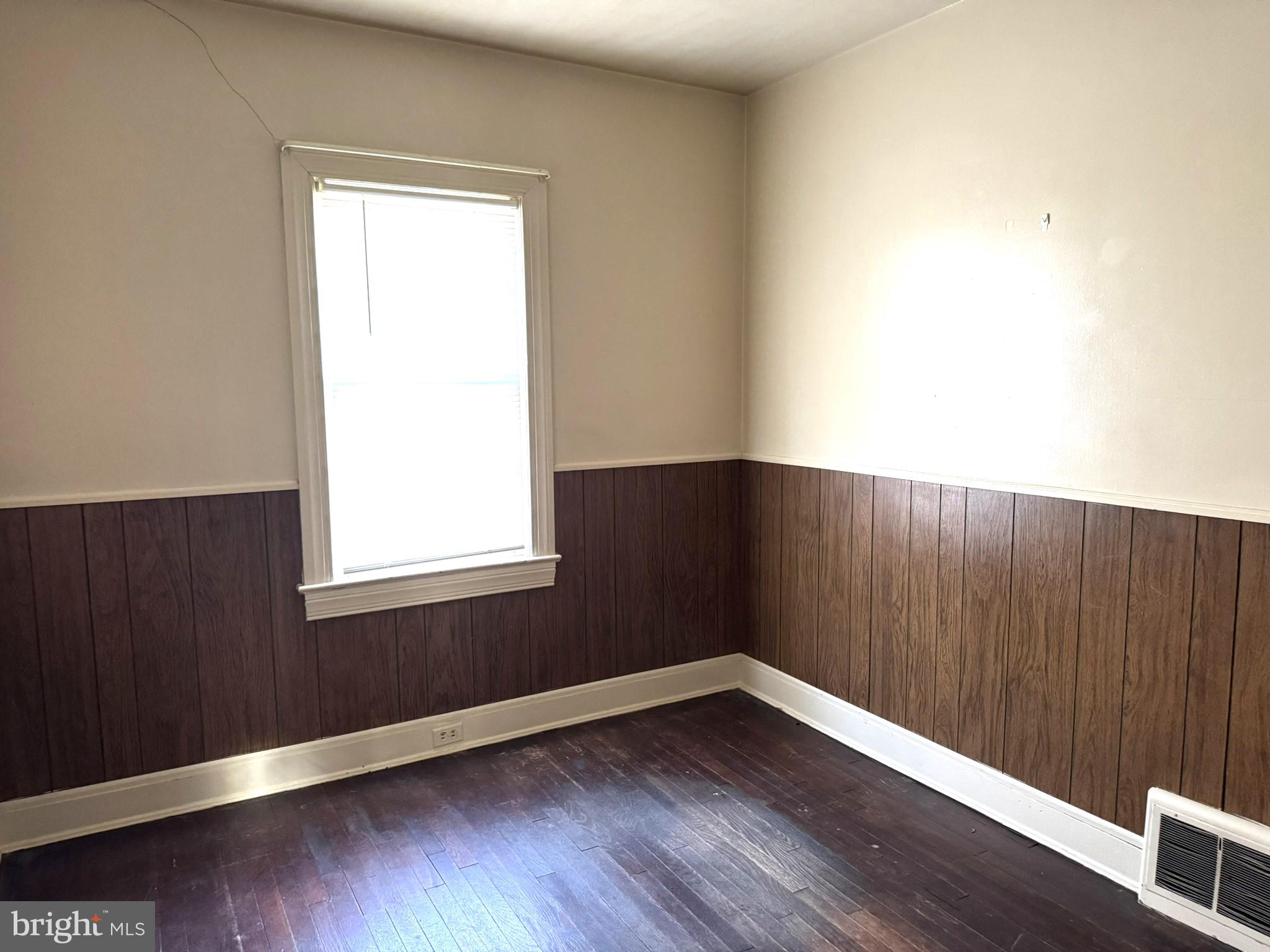 3494 Allen Road Eden, MD 21822 - Photo 19 of 38 an empty room with wooden floor and windows