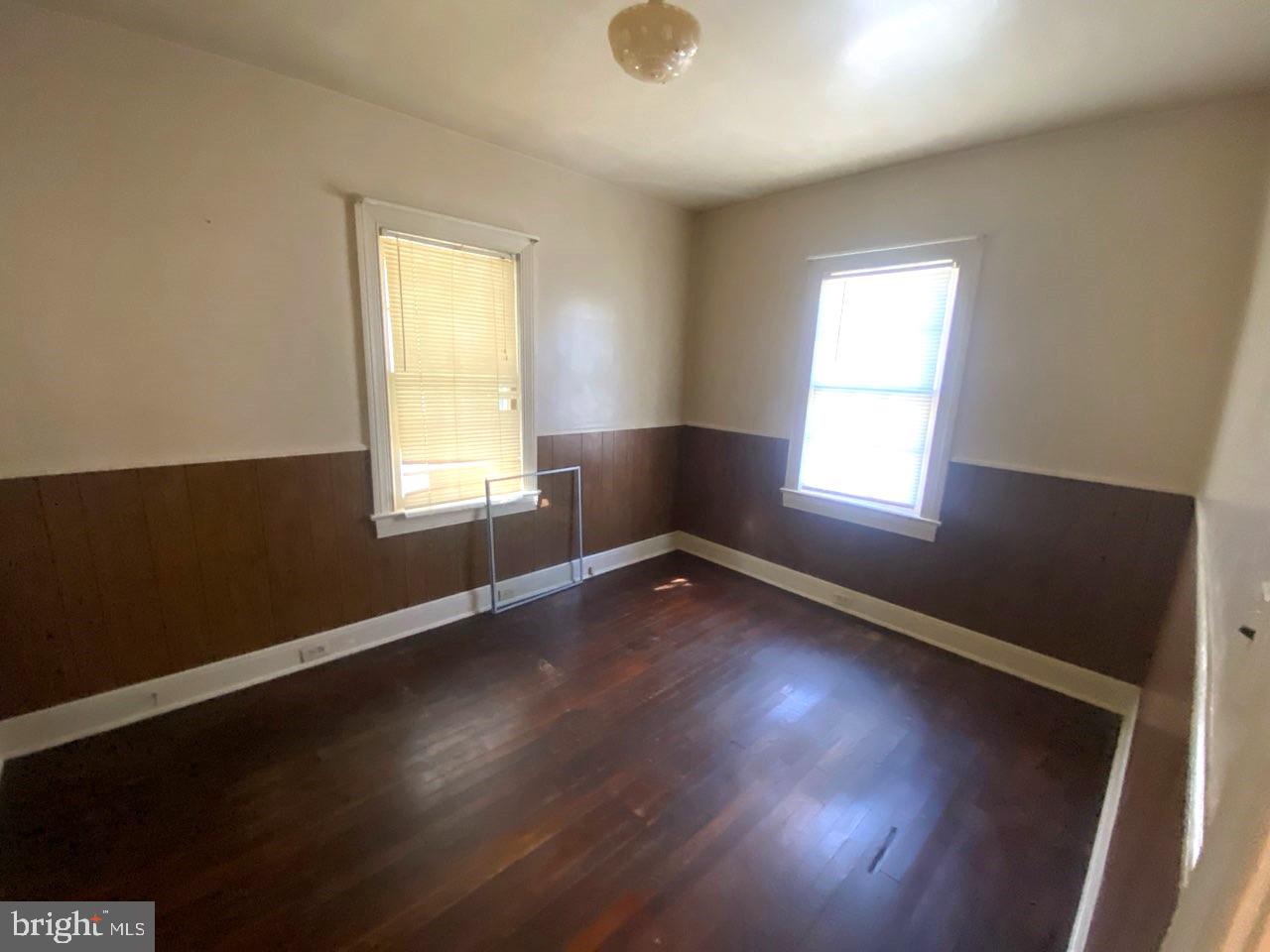3494 Allen Road Eden, MD 21822 - Photo 20 of 38 an empty room with wooden floor and windows