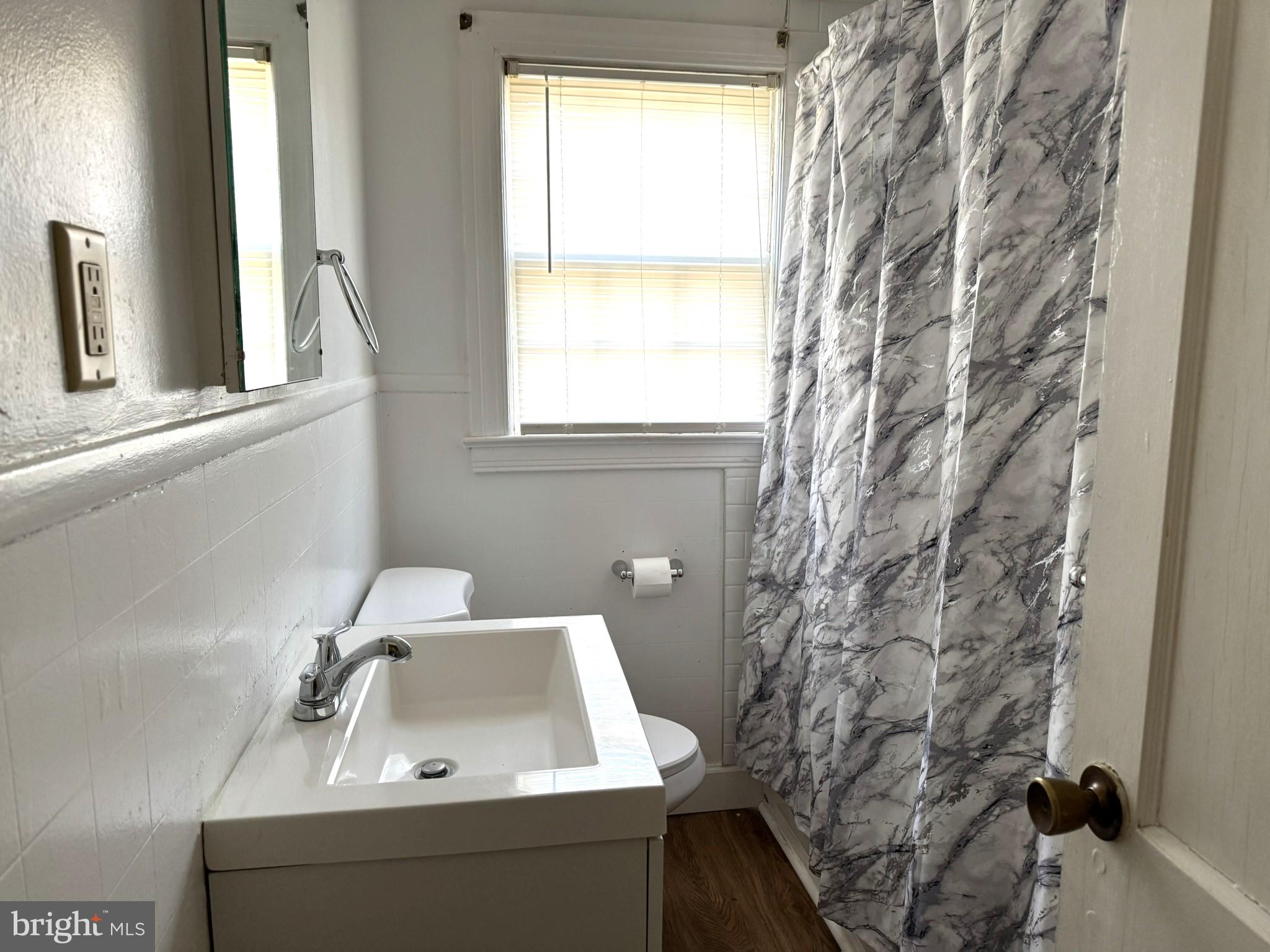 3494 Allen Road Eden, MD 21822 - Photo 21 of 38 a bathroom with a sink a window and a mirror