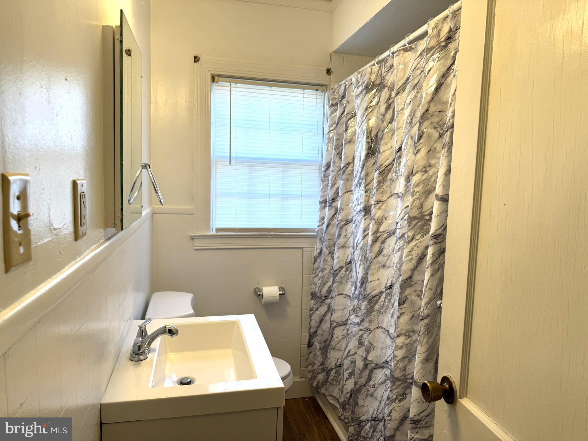 3494 Allen Road Eden, MD 21822 - Photo 24 of 38 a bathroom with a sink and mirror with bathtub