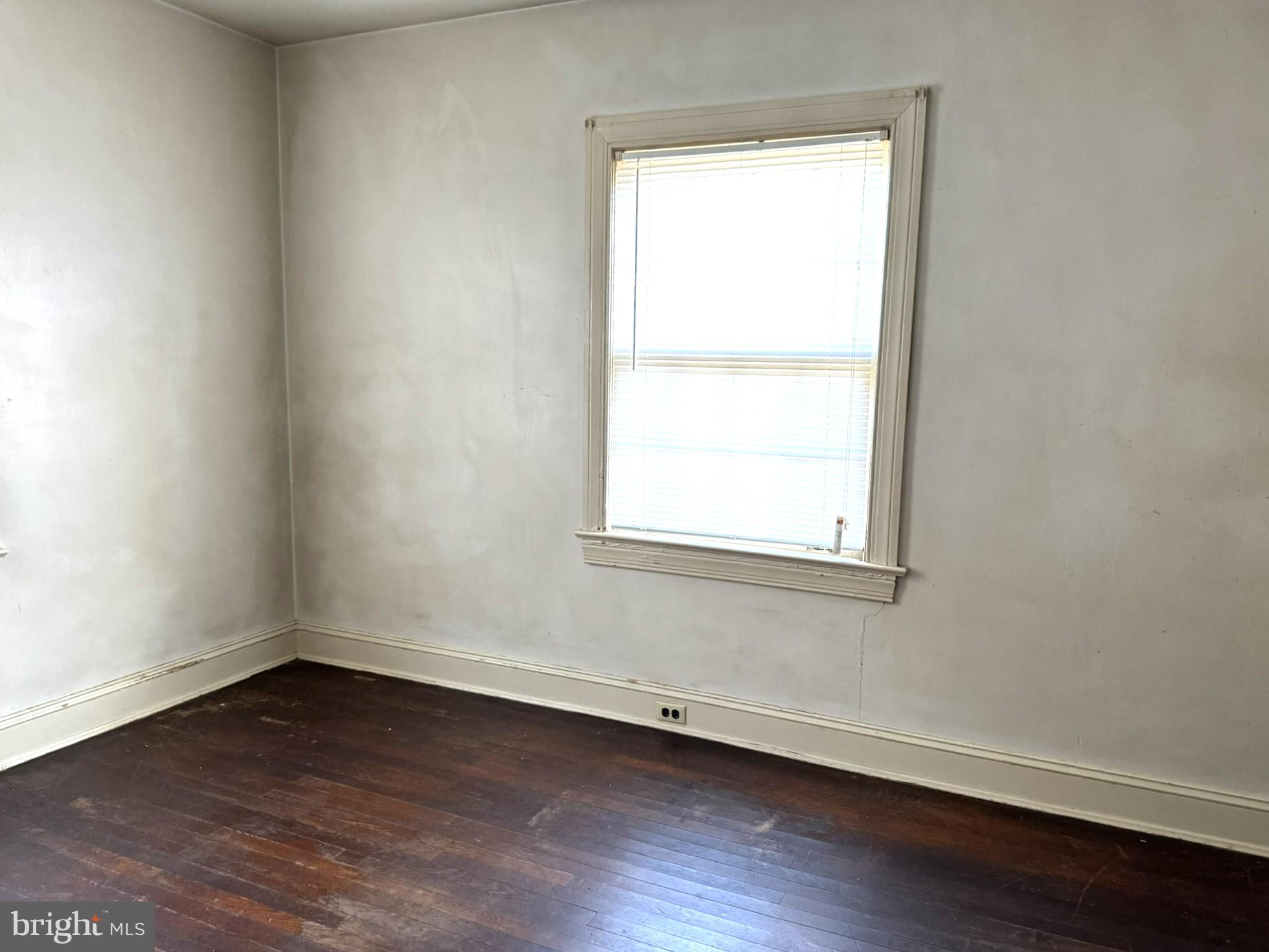 3494 Allen Road Eden, MD 21822 - Photo 27 of 38 an empty room with wooden floor and a window