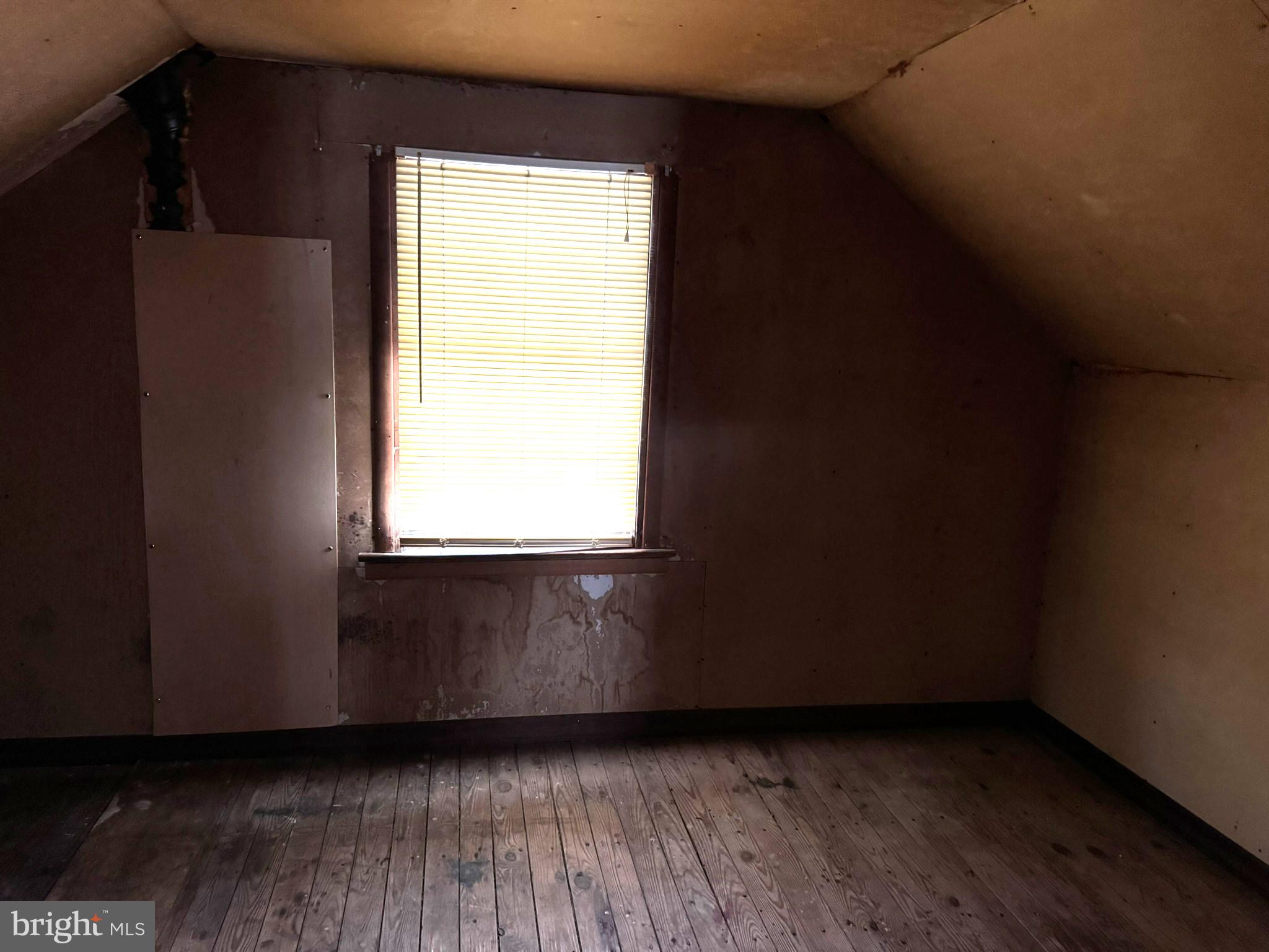 3494 Allen Road Eden, MD 21822 - Photo 32 of 38 a view of an empty room with wooden floor and a window