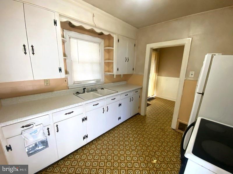 3494 Allen Road Eden, MD 21822 - Photo 6 of 38 a bathroom with a sink and a large mirror