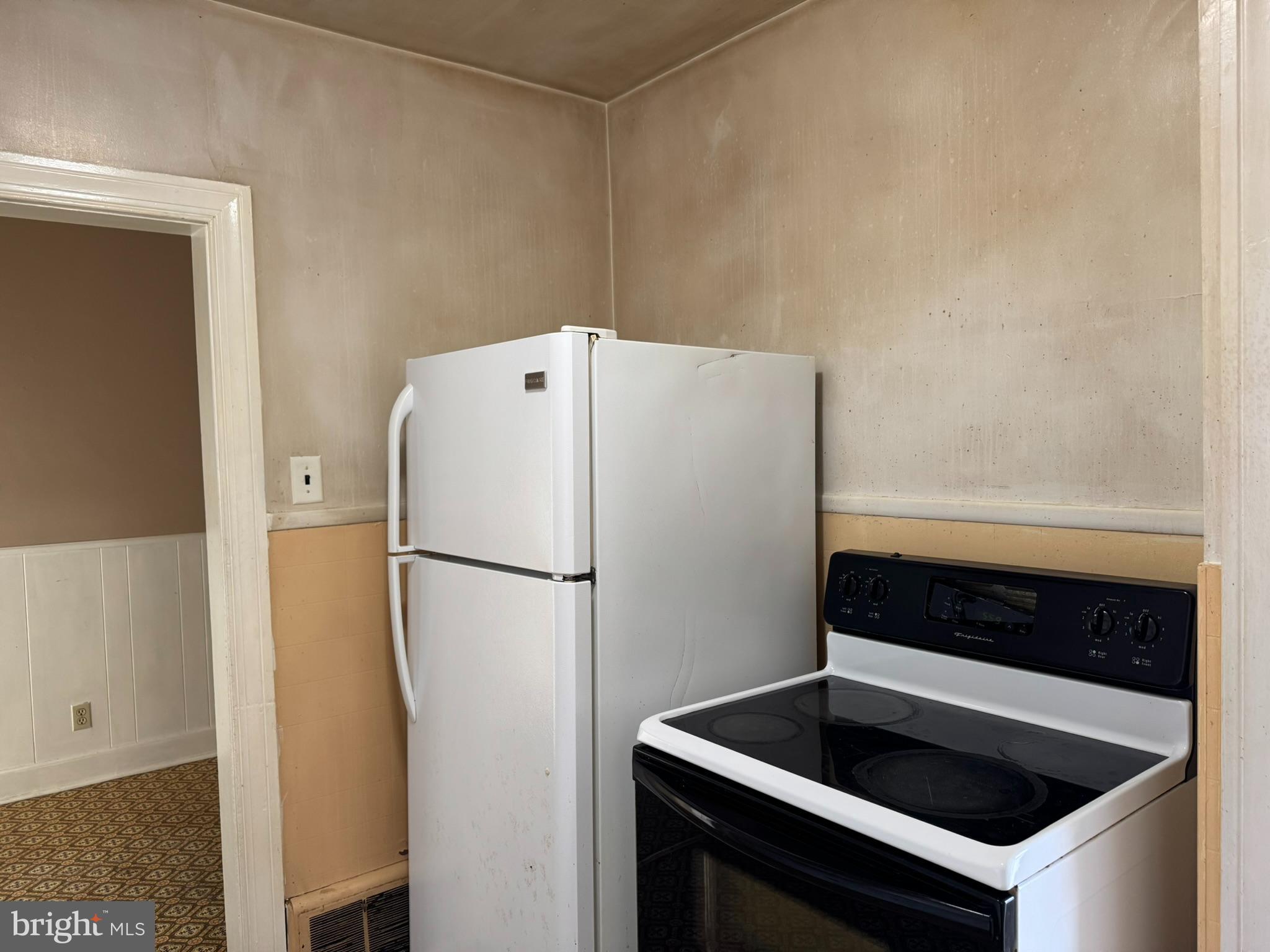 3494 Allen Road Eden, MD 21822 - Photo 9 of 38 a white refrigerator freezer sitting inside of a kitchen