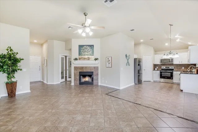 a view of kitchen and kitchen with furniture