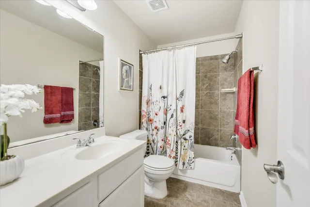a bathroom with a sink a toilet and a bathtub