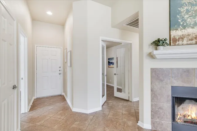 a view of a room that has a fireplace in it