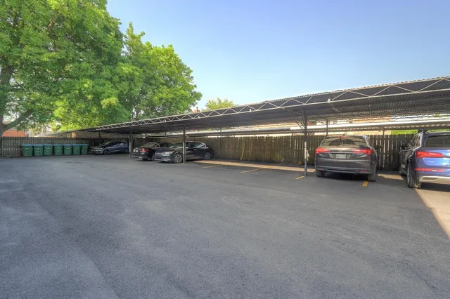 a view of a garden from a balcony