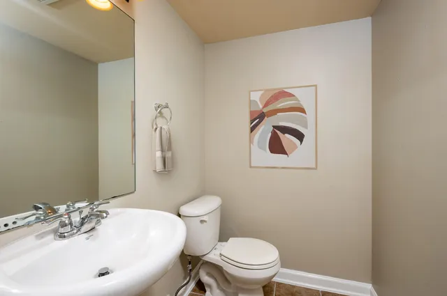 a bathroom with a sink and a toilet