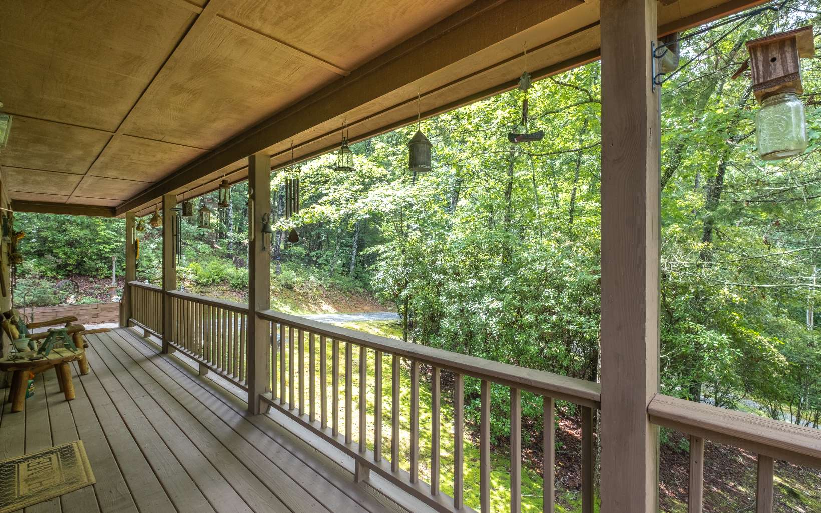628 Sandy Gap Road Murphy, NC 28906 - Photo 14 of 58 a view of a balcony with wooden floor