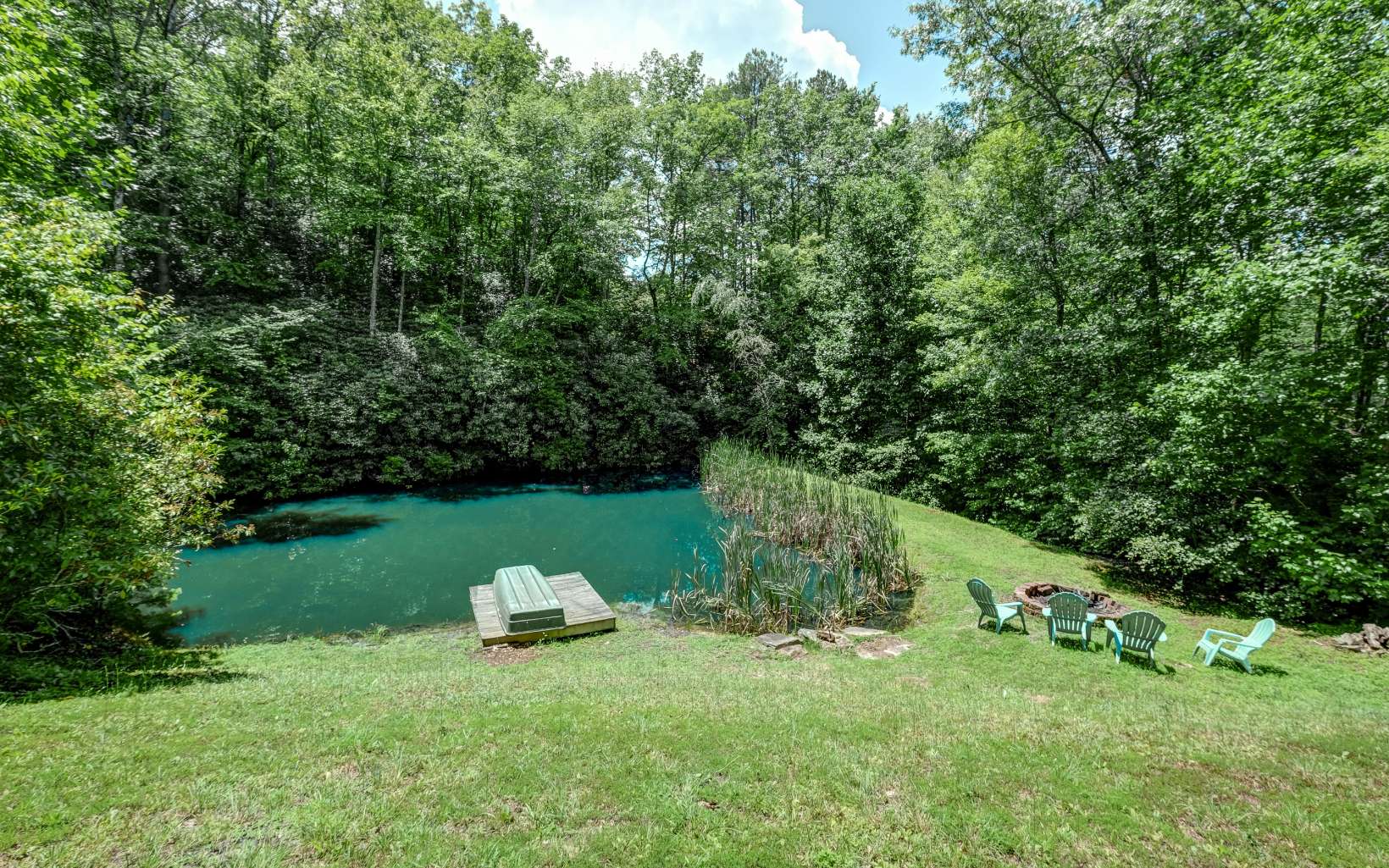 628 Sandy Gap Road Murphy, NC 28906 - Photo 16 of 58 a view of a garden with a slide