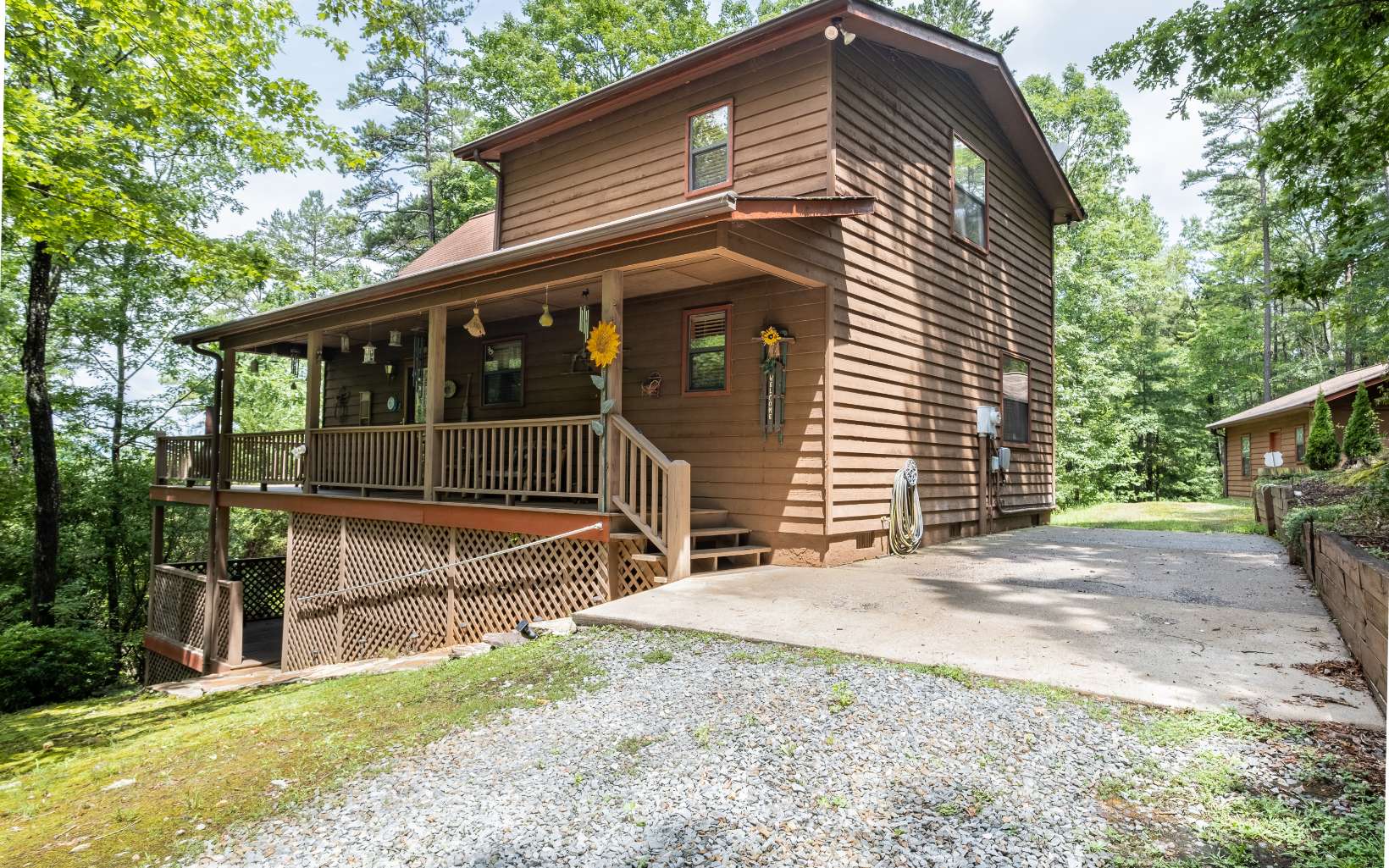 628 Sandy Gap Road Murphy, NC 28906 - Photo 2 of 58 a view of house with backyard and glass windows