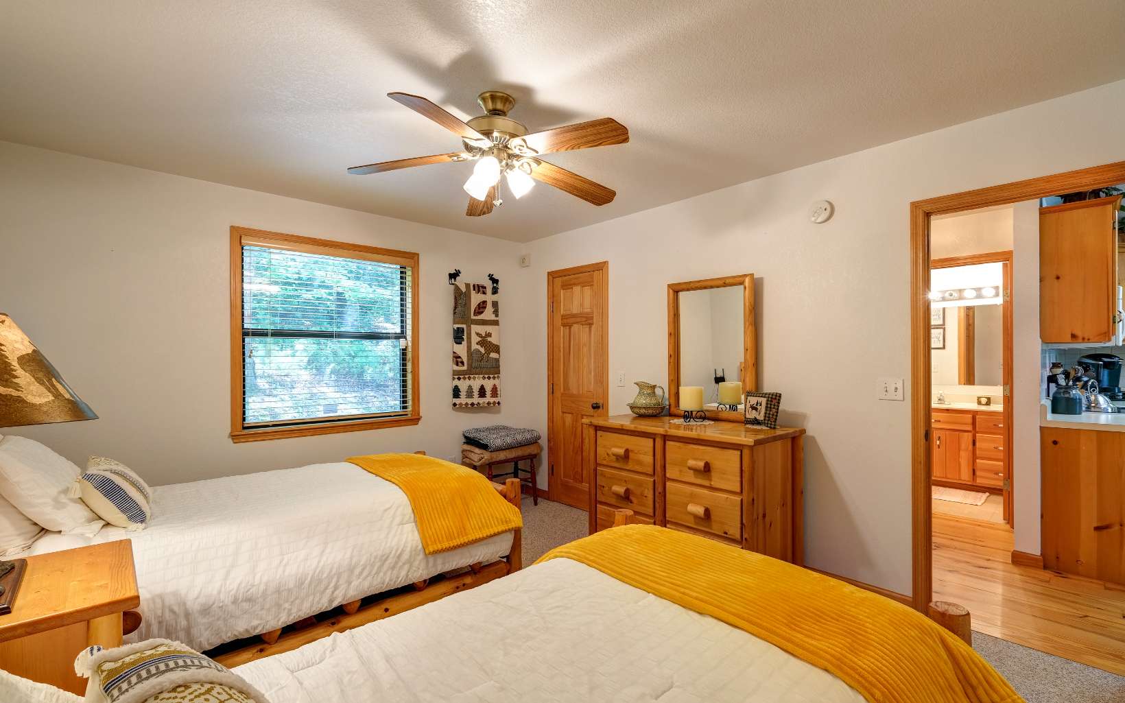 628 Sandy Gap Road Murphy, NC 28906 - Photo 31 of 58 a bedroom with two beds and a chandelier