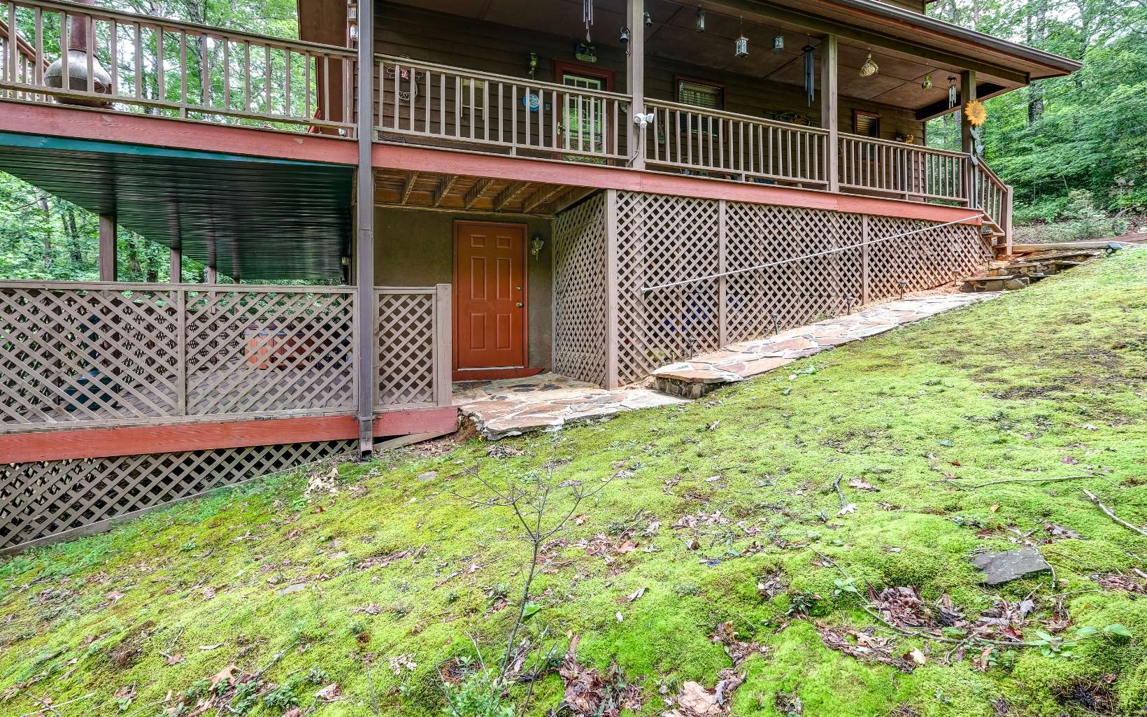 628 Sandy Gap Road Murphy, NC 28906 - Photo 43 of 58 a view of a house with a small yard and wooden fence
