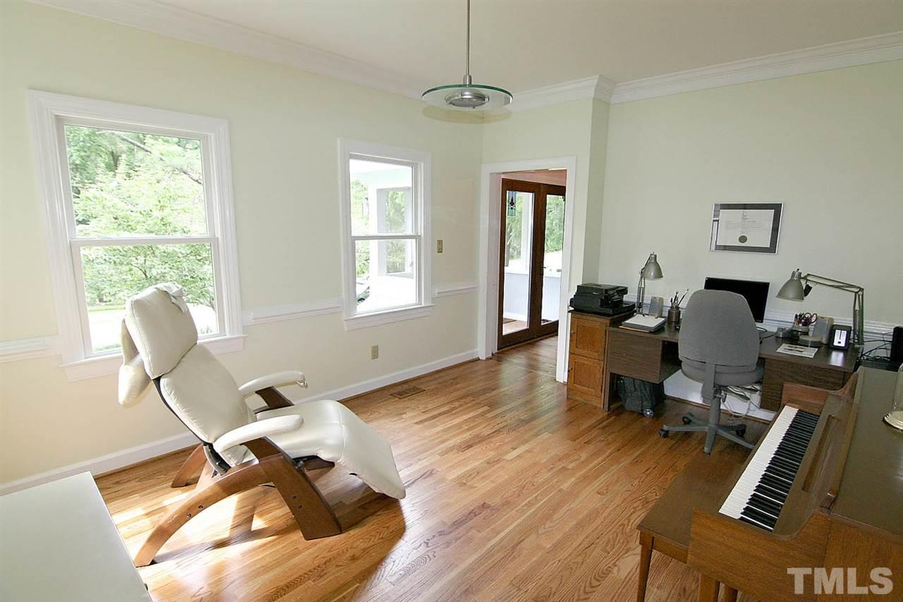 206 Lawrence Road Cary, NC 27511 - Photo 12 of 25 a workspace with wooden floor