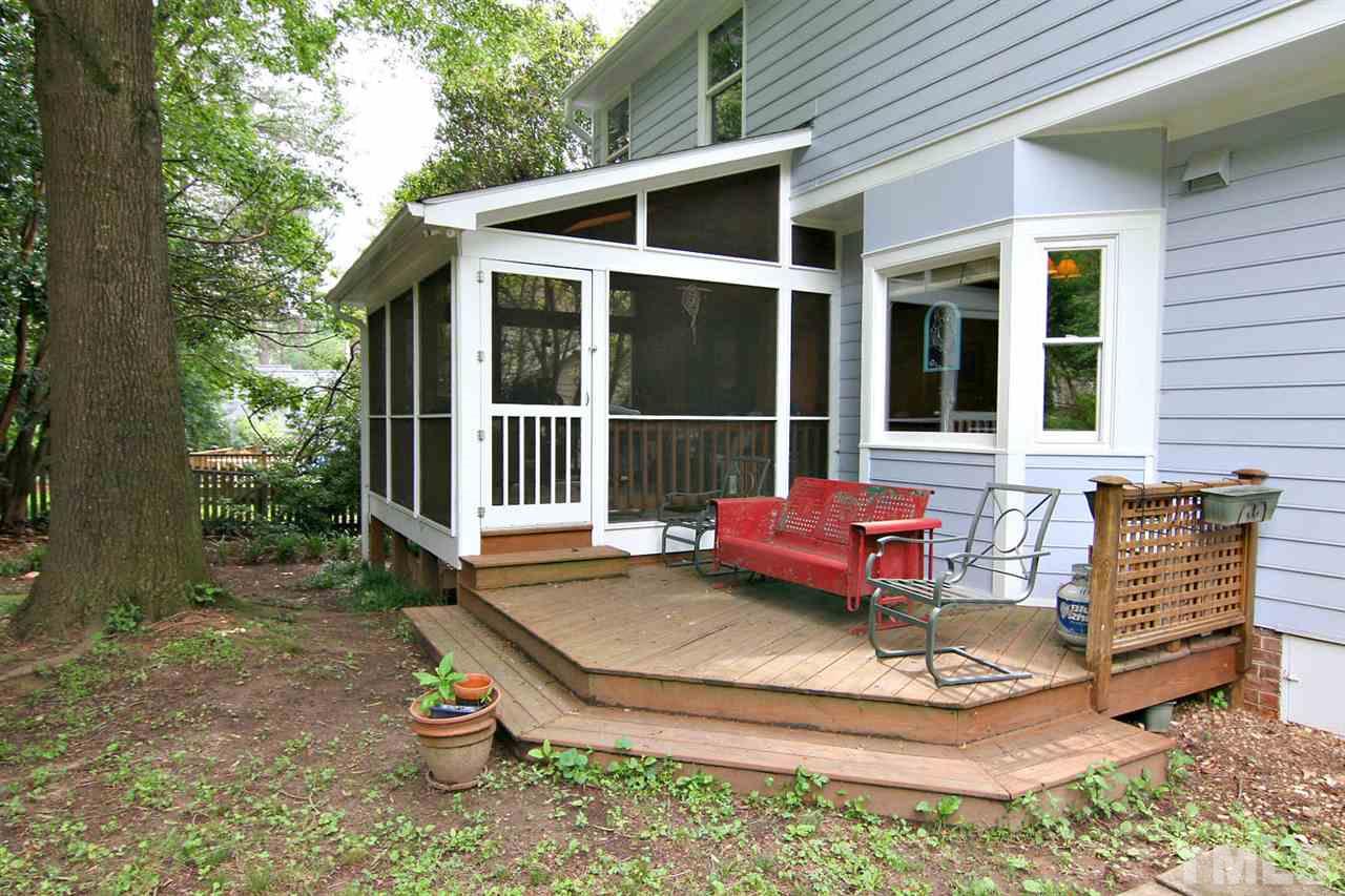 206 Lawrence Road Cary, NC 27511 - Photo 19 of 25 a house view with a sitting space fire pit and outdoor space
