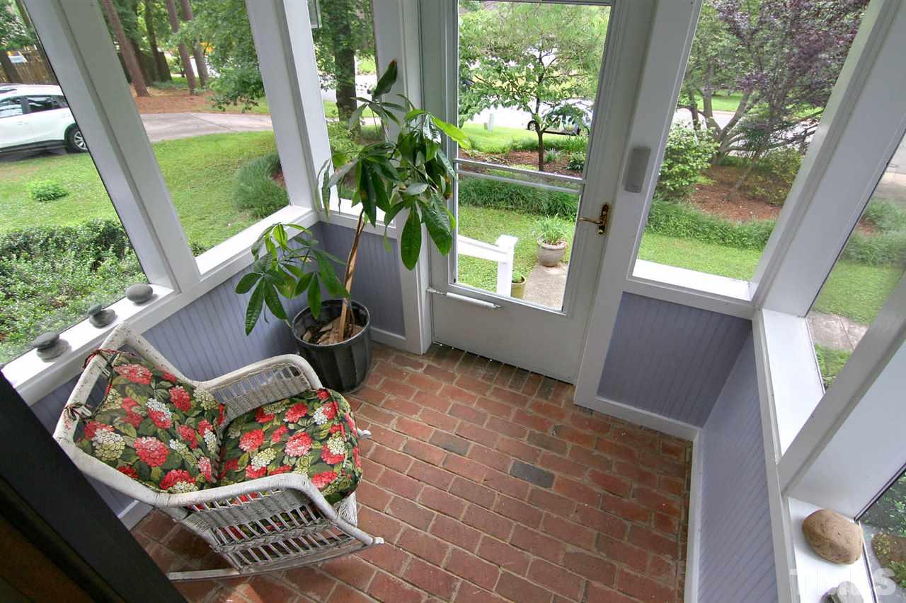206 Lawrence Road Cary, NC 27511 - Photo 22 of 25 a outdoor living space with furniture and garden view