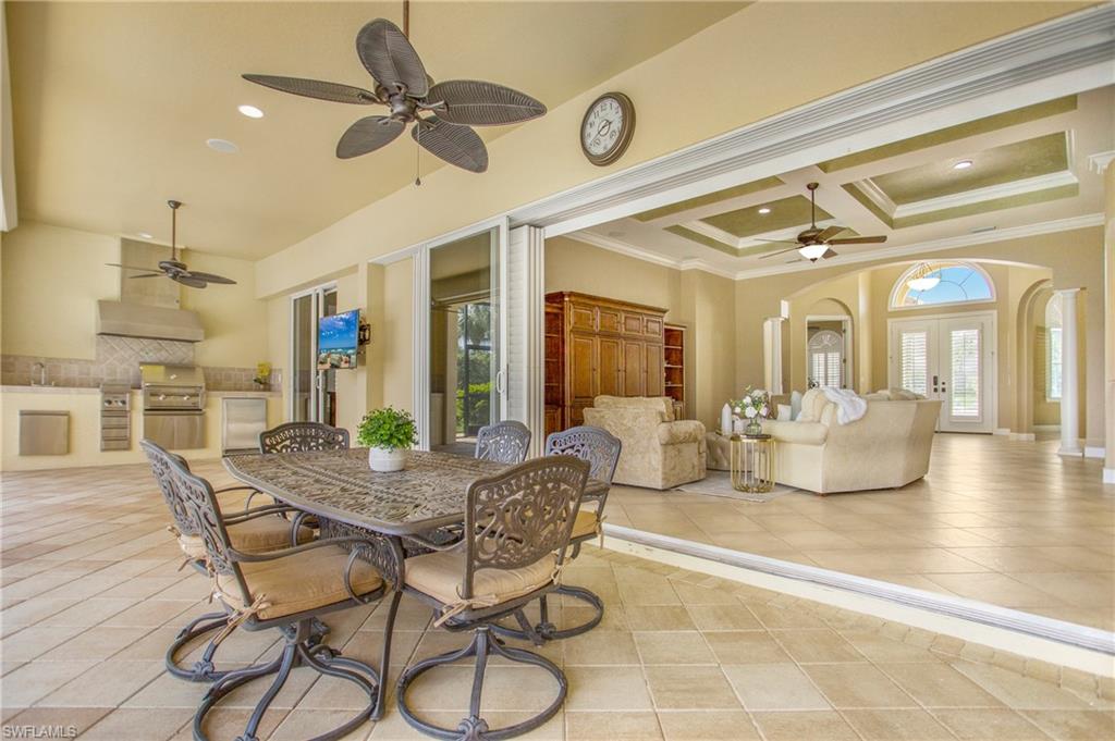 9807 Nickel Ridge Circle Naples, FL 34120 - Photo 40 of 50 a view of a livingroom and dining room