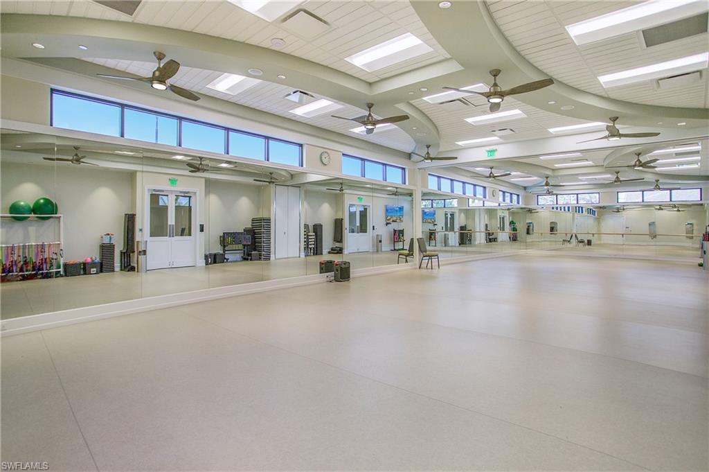 9807 Nickel Ridge Circle Naples, FL 34120 - Photo 48 of 50 a lobby with furniture and a garage