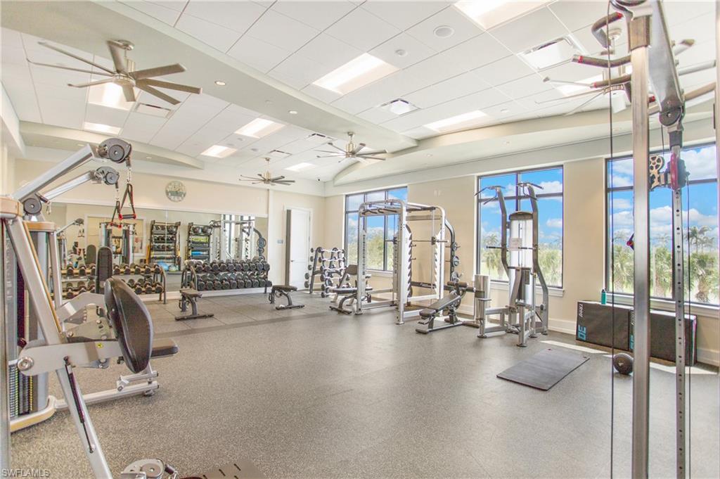 9807 Nickel Ridge Circle Naples, FL 34120 - Photo 50 of 50 a view of a room with gym equipment