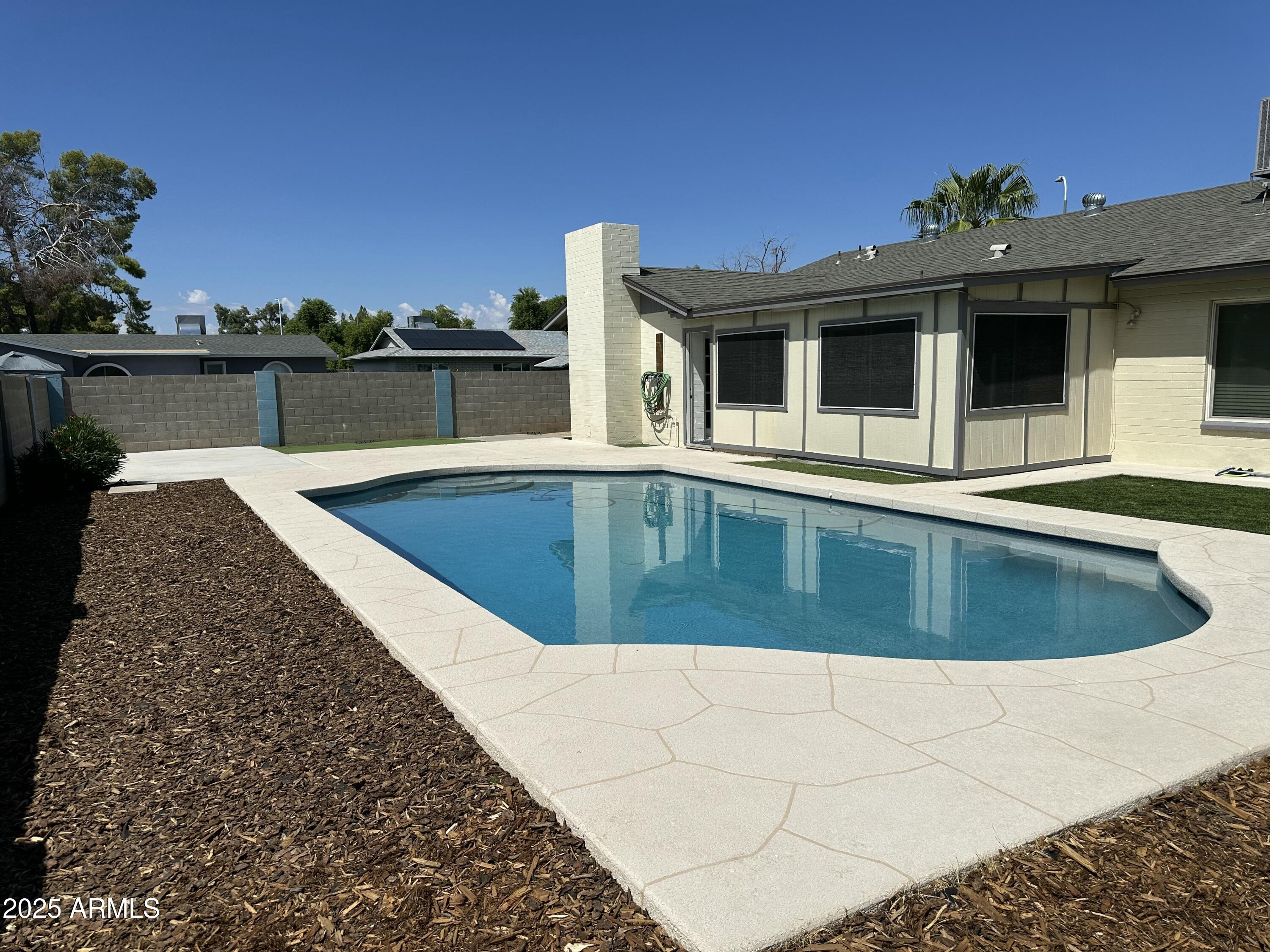 4639 West Ruth Avenue Glendale, AZ 85302 - Photo 20 of 23 a view of outdoor space yard and swimming pool