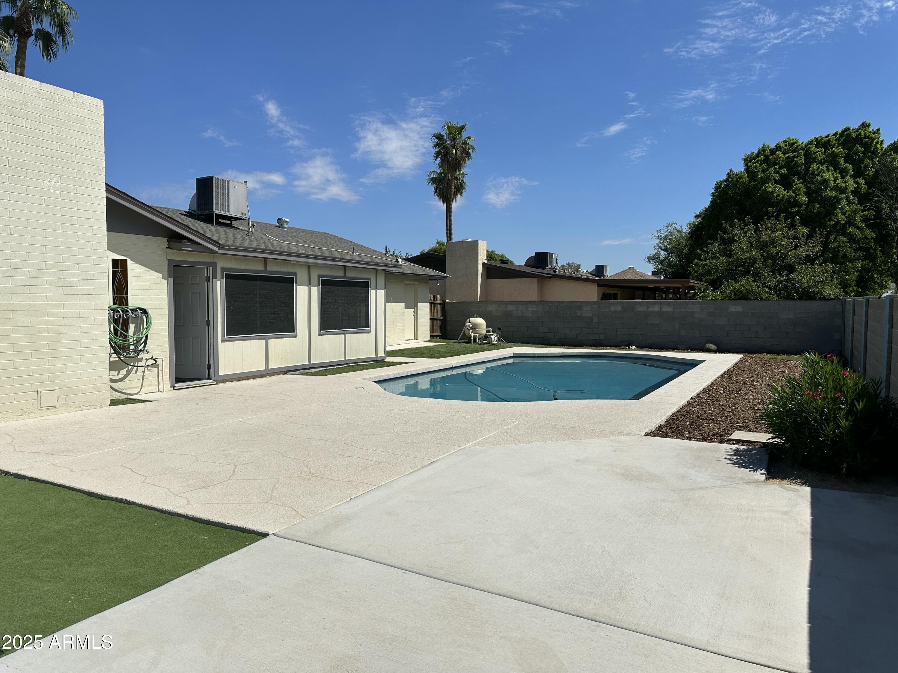 4639 West Ruth Avenue Glendale, AZ 85302 - Photo 23 of 23 a view of outdoor space yard and swimming pool