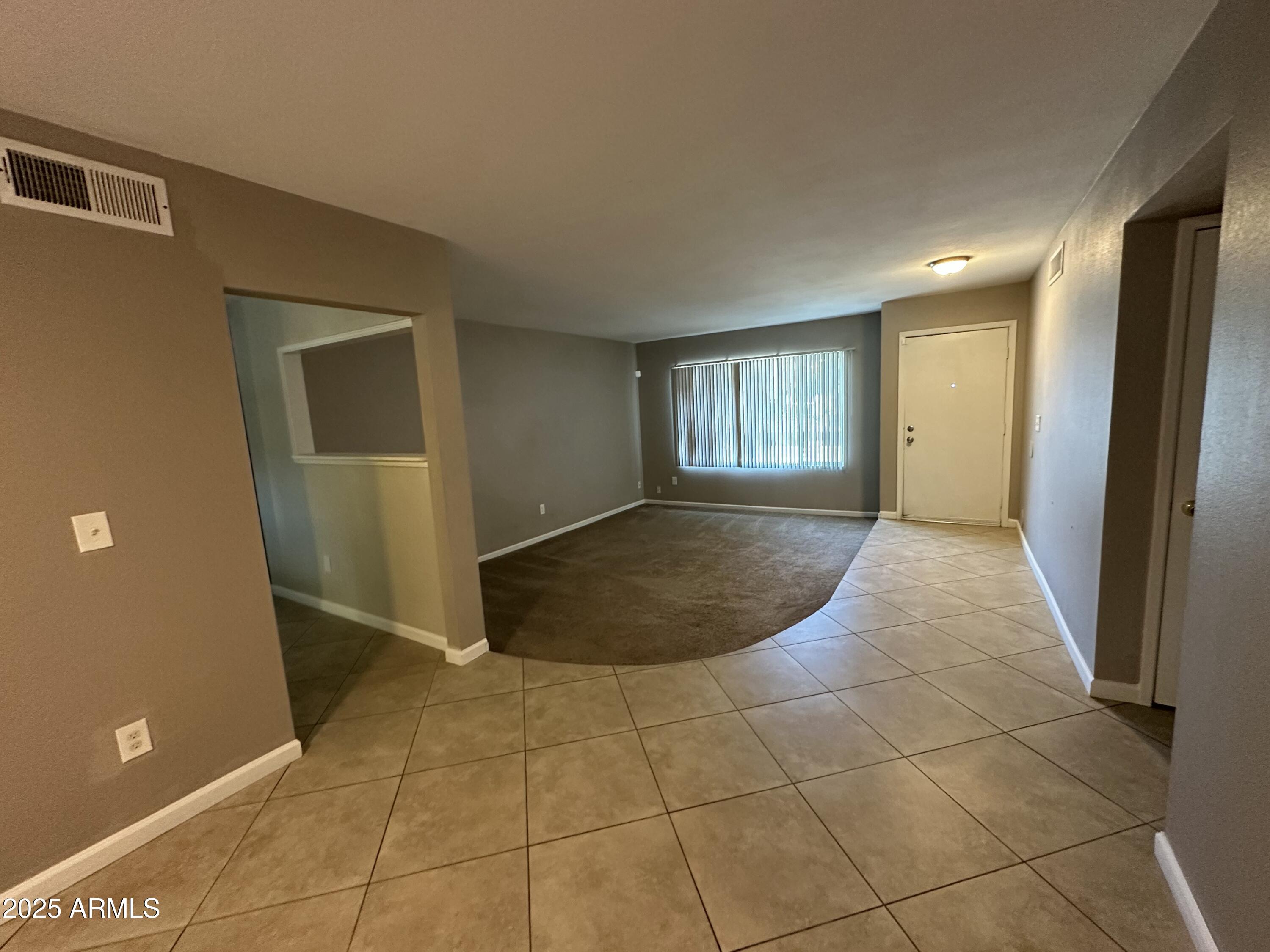 4639 West Ruth Avenue Glendale, AZ 85302 - Photo 3 of 23 a view of a hallway