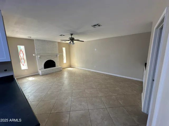 a view of a livingroom with a staircase