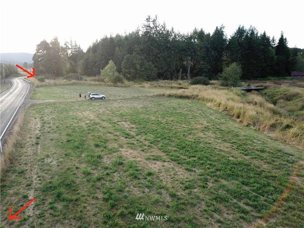 1980 Lincoln Creek Road Rochester, WA 98579 - Photo 7 of 22 a view of outdoor space with green field and trees