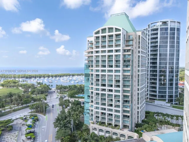 a view of a building with a yard