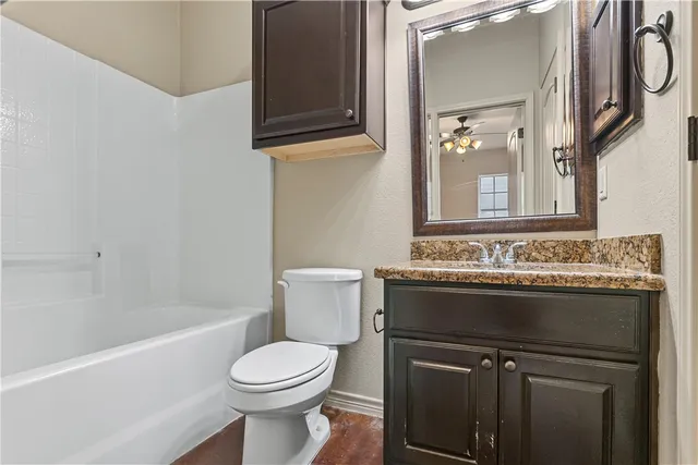 a bathroom with a sink and a toilet