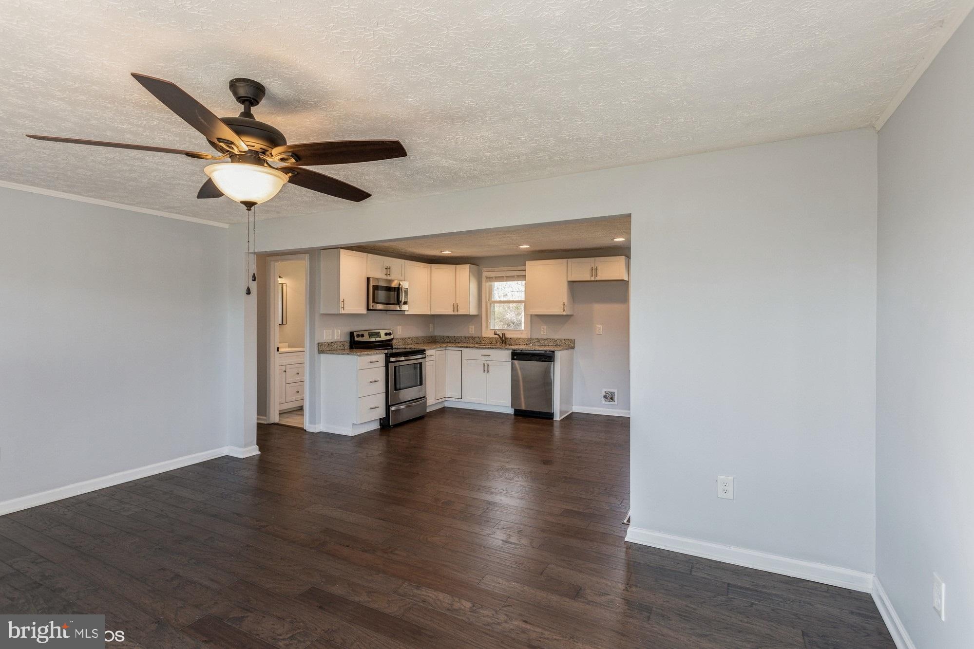 9828 Courthouse Road Spotsylvania, VA 22553 - Photo 16 of 38 Living room open to Kitchen