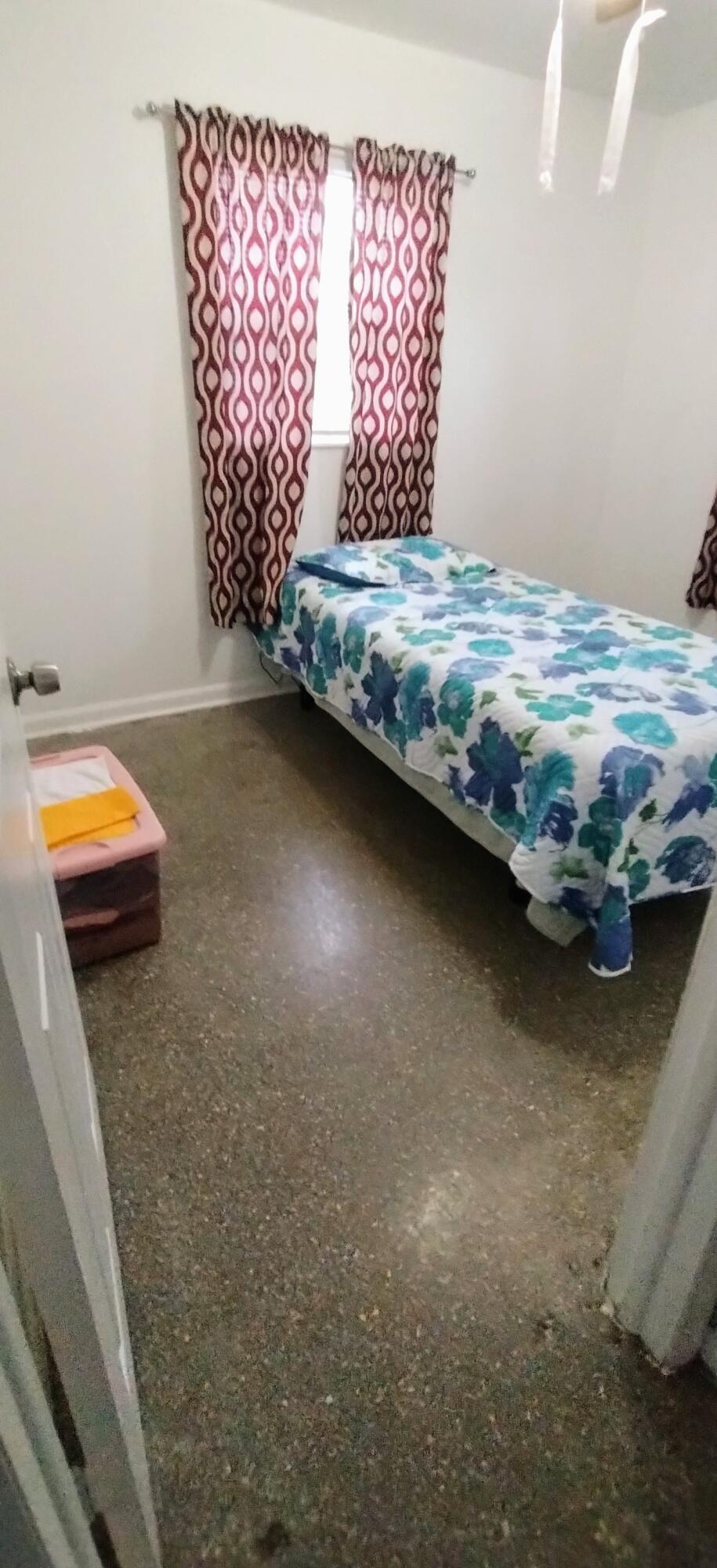 4100 Edwards Street Melbourne, FL 32901 - Photo 13 of 22 a view of empty room with window